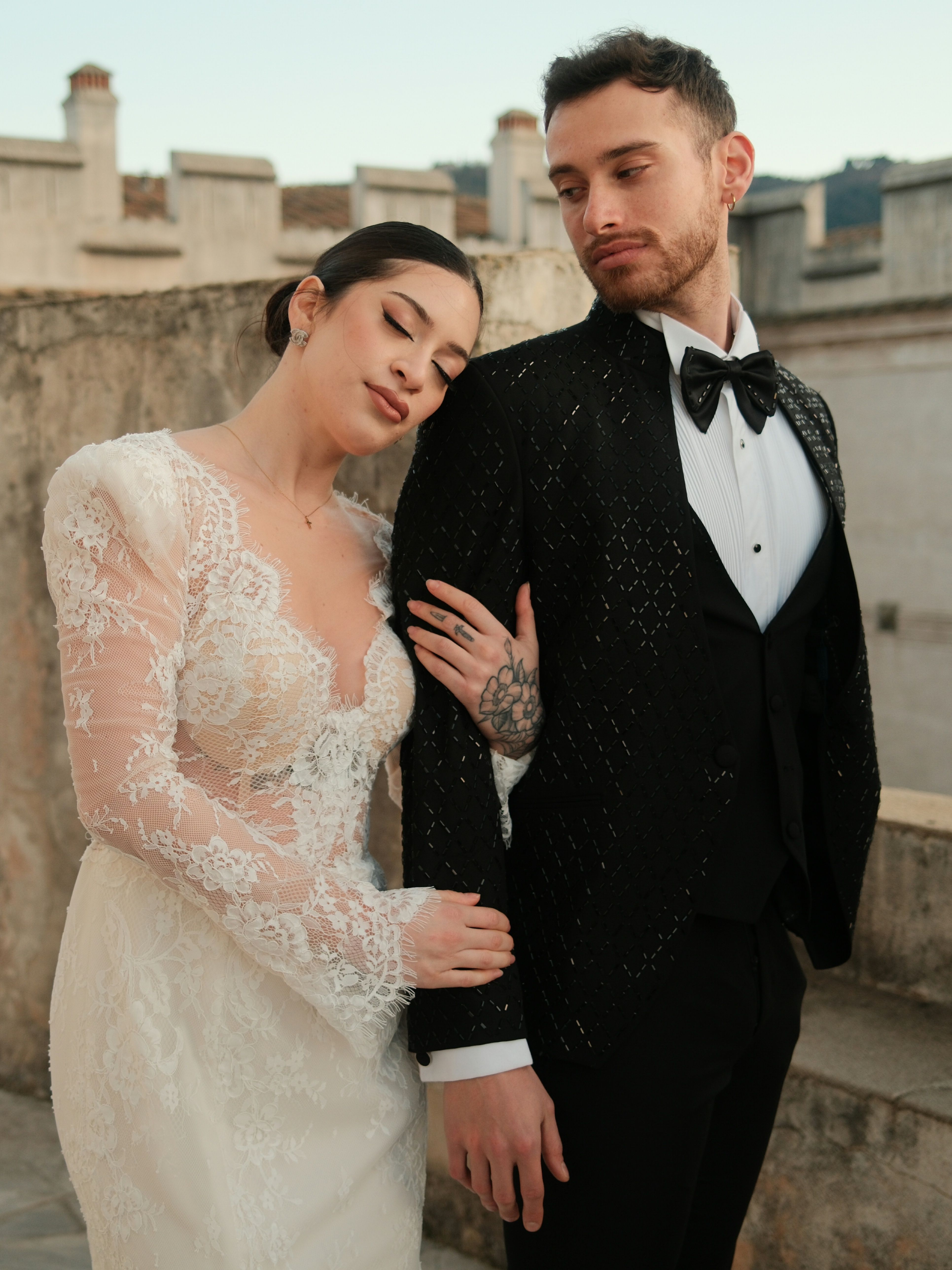 Elegant Couple in Formal Attire at Outdoor Venue · Free Stock Photo