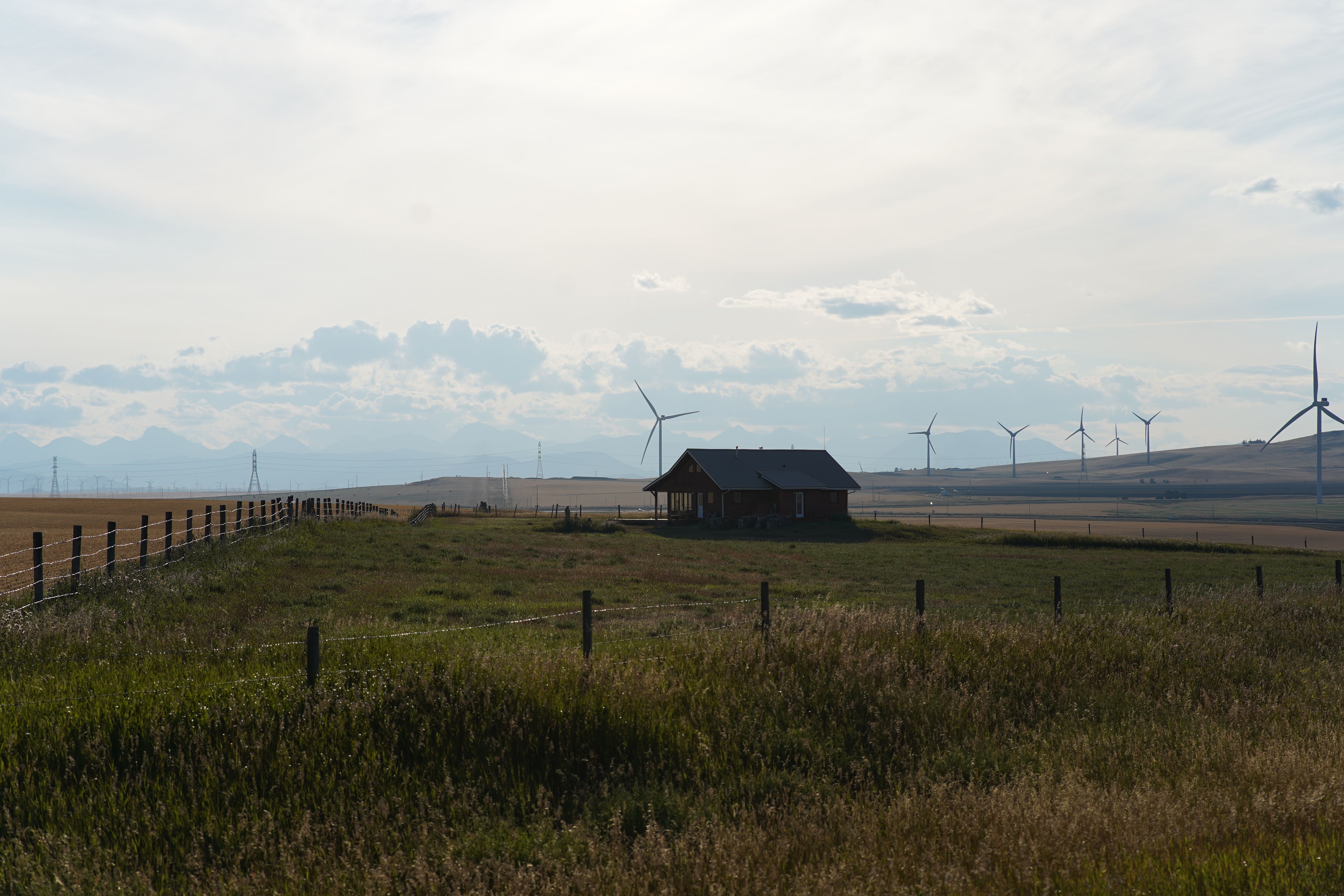 Rural Canadian Landscape with Red Farmhouse and Wind Turbines · Free ...
