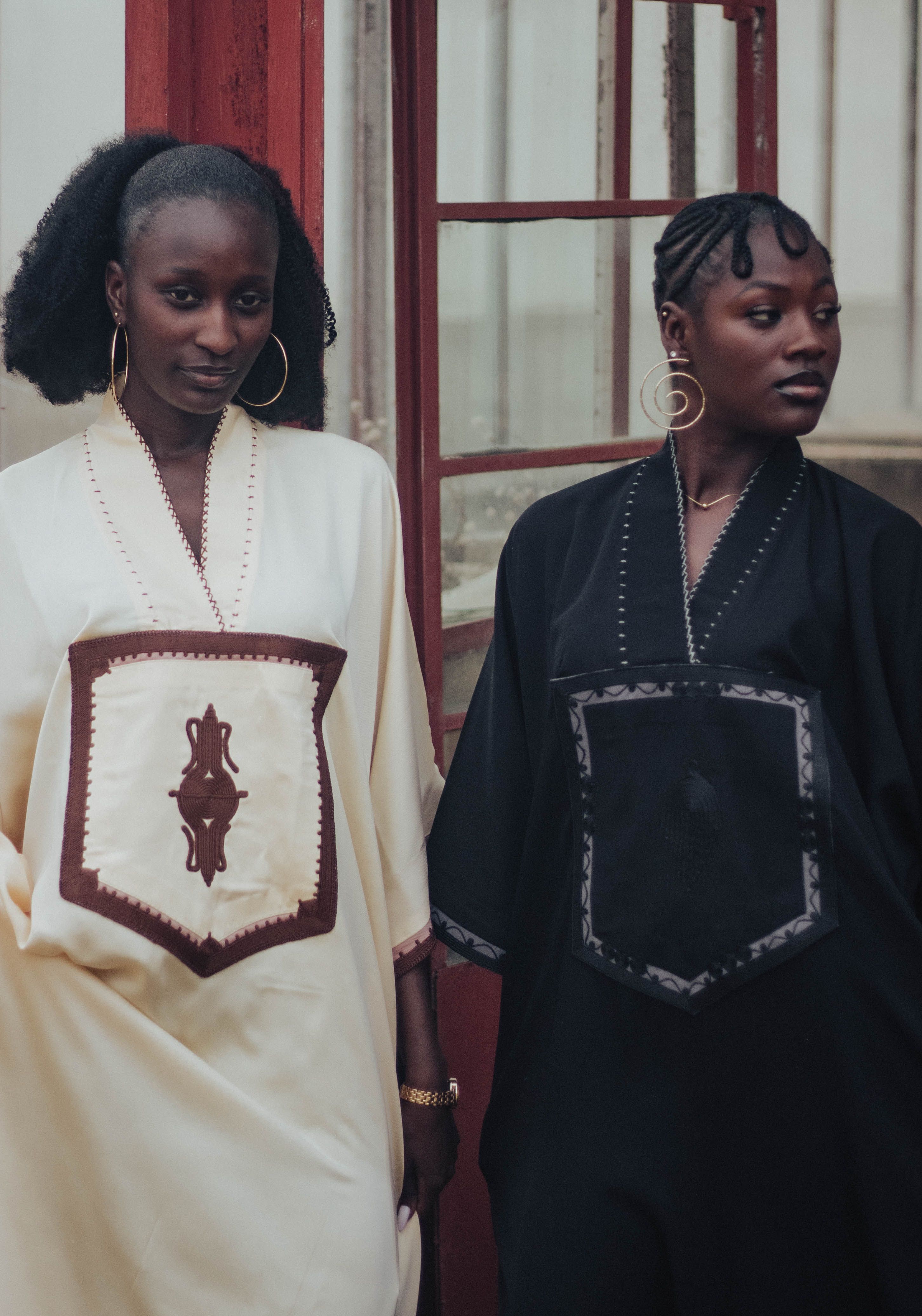 Stunning Portrait of Two Women in Traditional Attire · Free Stock Photo