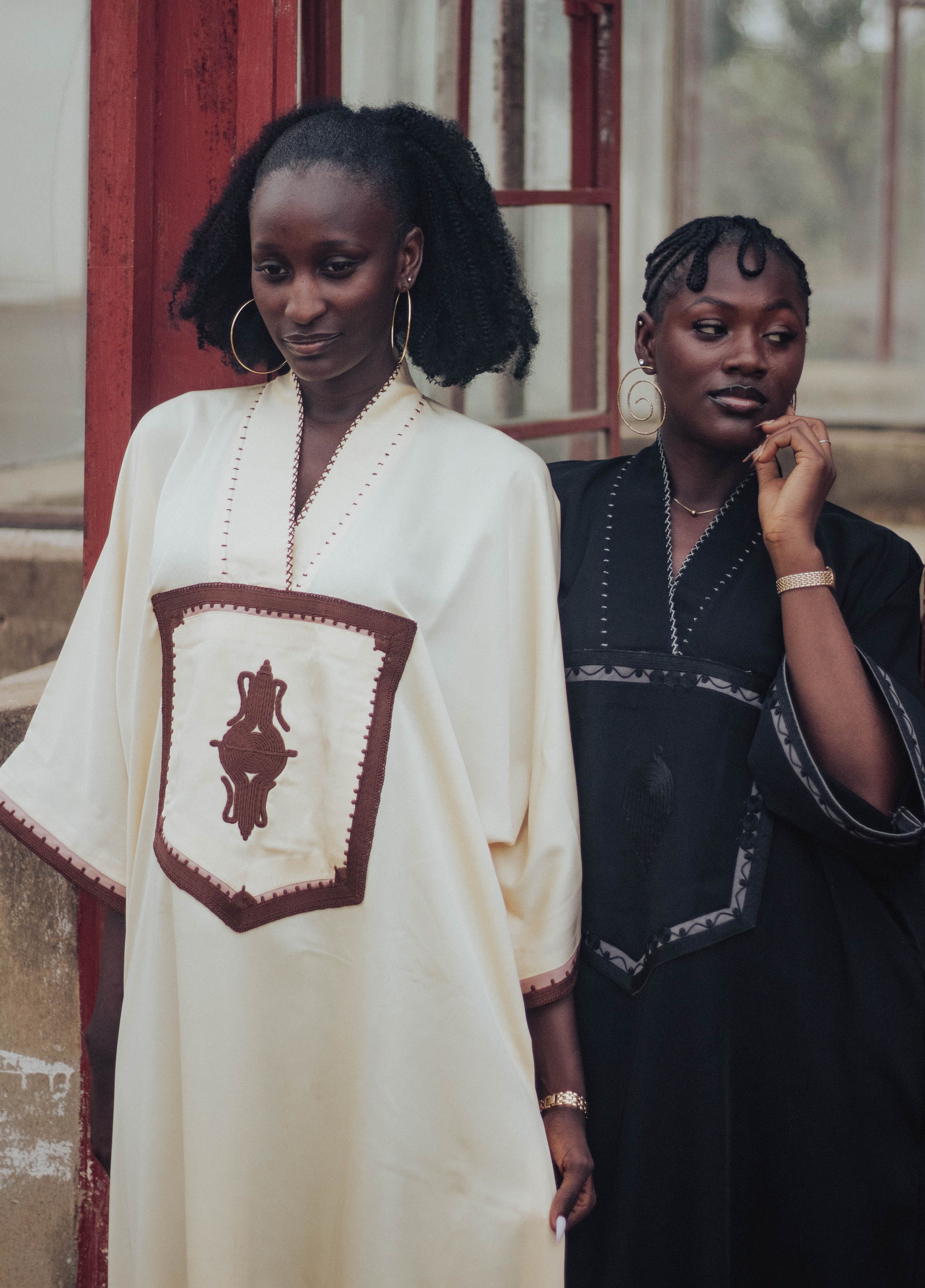 Portrait of Two Elegant Women in Traditional Attire · Free Stock Photo