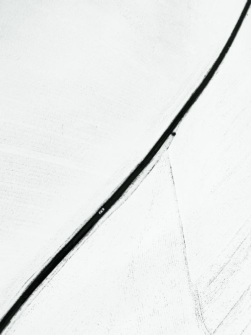 Snow-covered road from above — photo by Onur Polat on Pexels