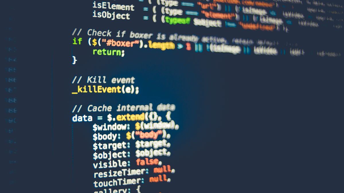 Close-up of colorful lines of programming code on a computer screen with no people in the frame, a real stock photo chosen because the whole story is about Epic telling its Star Wars and Marvel shooter team to stop writing code by hand