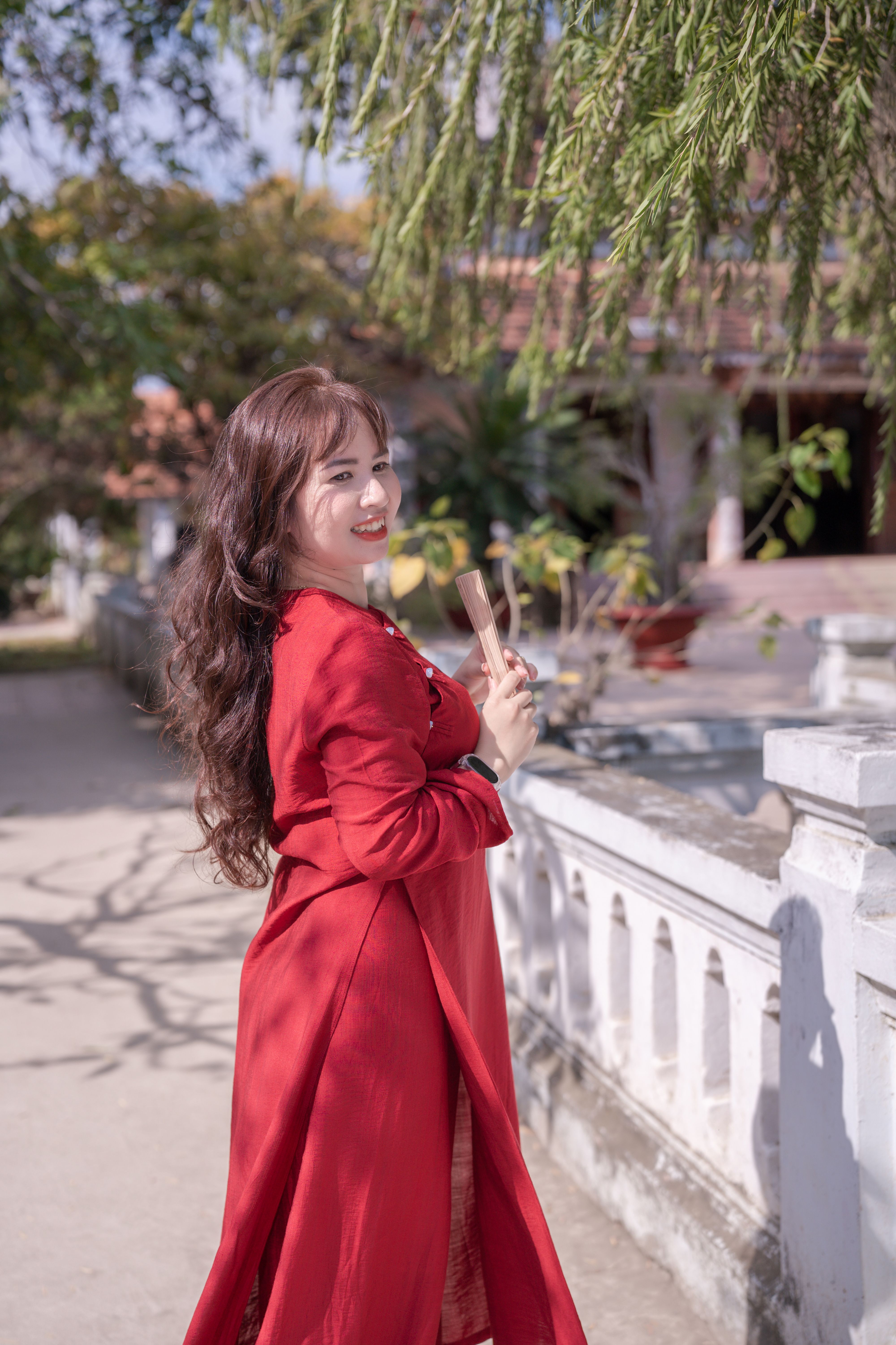 Elegant Woman in Red Dress Outdoors · Free Stock Photo