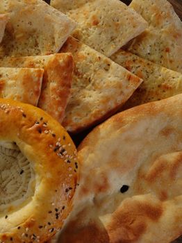 Close-up shot of various artisanal flatbreads showcasing texture and diversity.