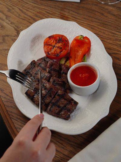 Grilled steak with roasted peppers — Nadin Sh on Pexels