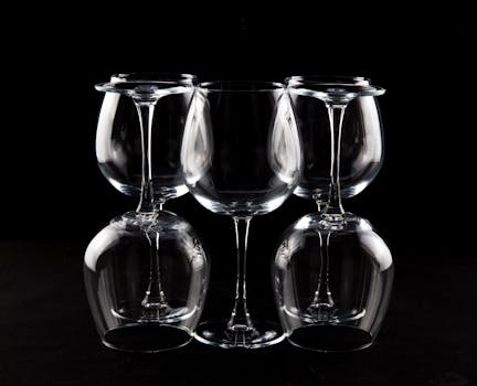 A sophisticated arrangement of wine glasses, beautifully displayed against a black background.