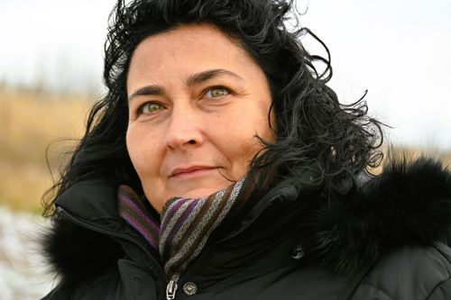 Free Close-up of a woman dressed warmly in a winter coat, outdoors in Weinstadt. Stock Photo
