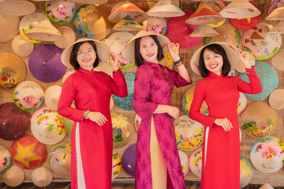 Person wearing lightweight, breathable clothing and a traditional nón lá hat in Vietnam