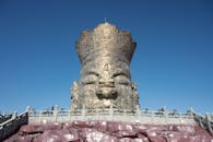 Magnificent Buddhist Statue in Shanghai's Clear Skies