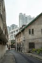 Historic Alleyway Amidst Shanghai's Modern Skyline