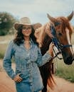 Woman in Denim with Horse Outdoors