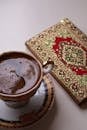 Elegant Coffee Cup with Intricate Journal
