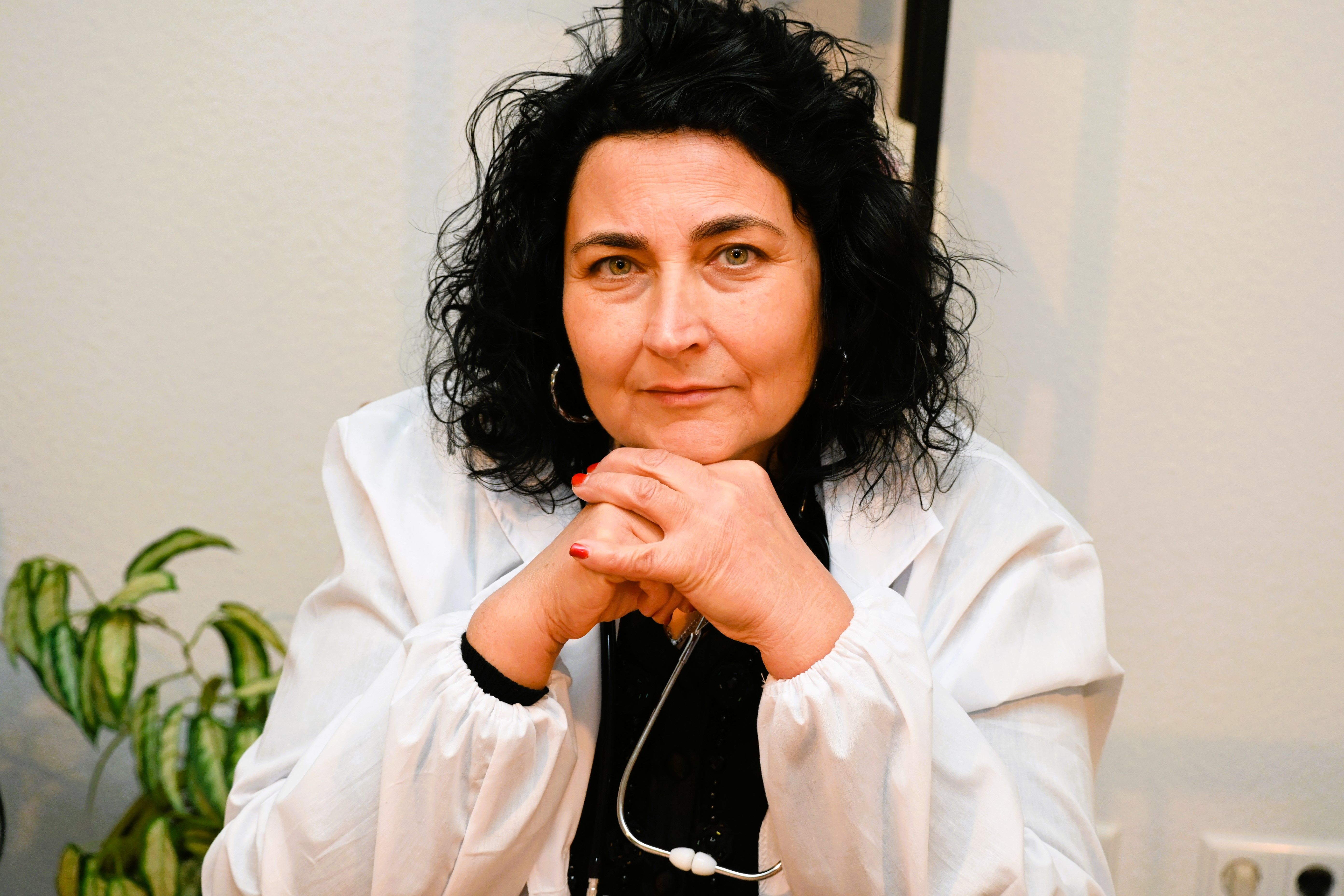 Female doctor in a medical office in Weinstadt, Germany, exemplifying professionalism and care.
