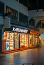 Nighttime view of an Asian retail storefront