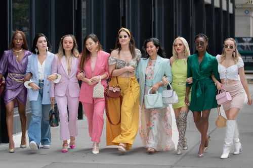Free Group of stylish women walking together in vibrant outfits in New York City. Stock Photo