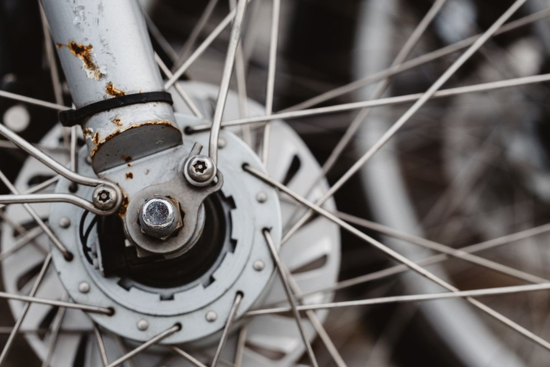 Rusty Spoke Rims Close-up of Rusty Bicycle Wheel with Spokes · Free Stock Photo
