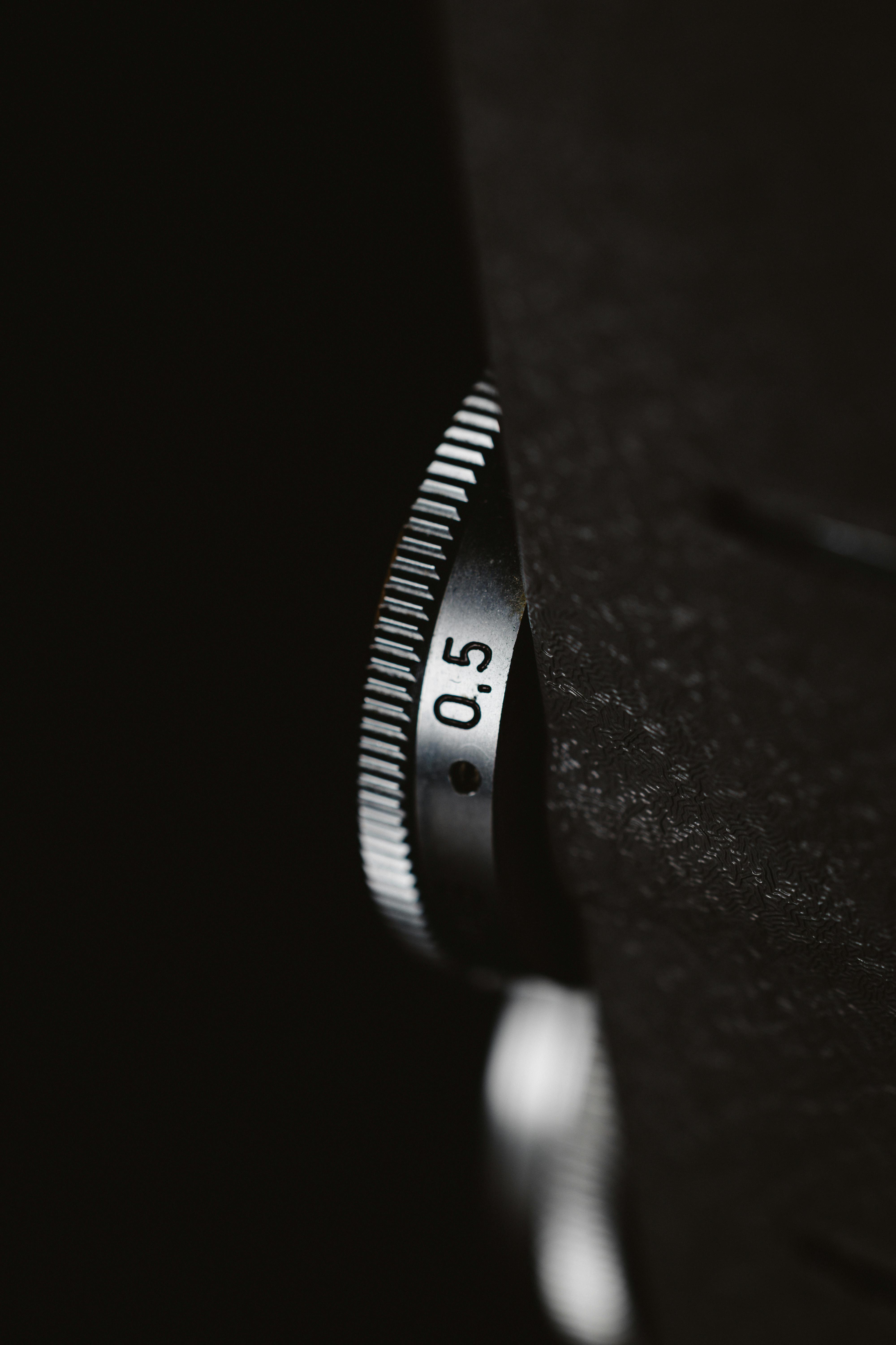 Free Detailed image of a metal dial showing an engraving of 0.5 for precision equipment. Stock Photo