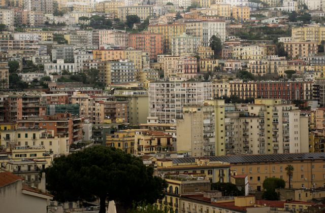 A vibrant aerial view of Naples's diverse architecture, capturing the city's essence. — arriving in Napoli