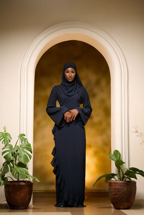 Elegant Woman in Hijab Posing Indoors · Free Stock Photo