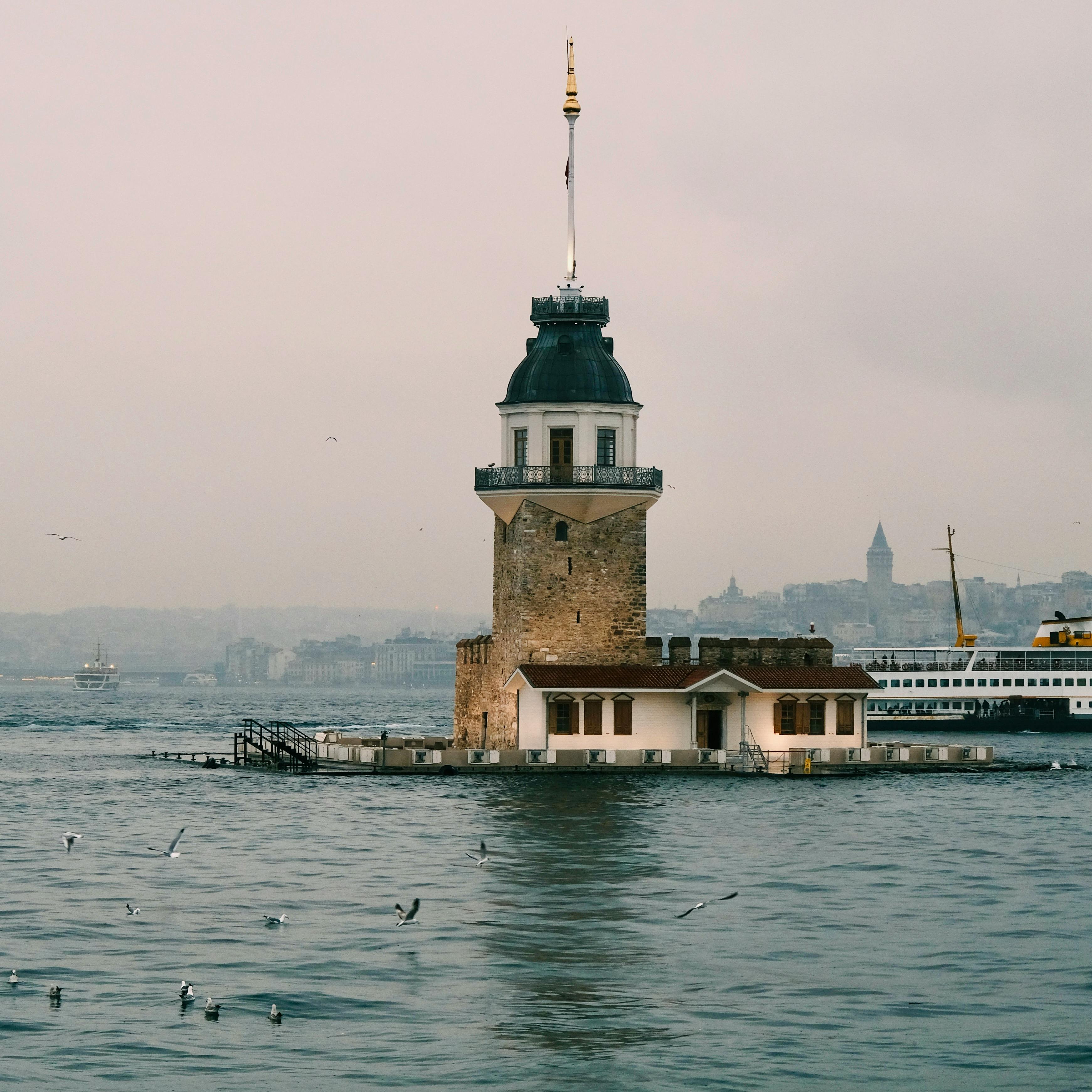 Beautiful view of the Maiden's Tower with Istanbul's skyline in the background.