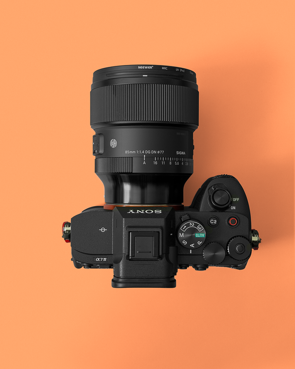 Dslr Colored Camera Modern DSLR Camera on Vibrant Orange Background · Free Stock Photo