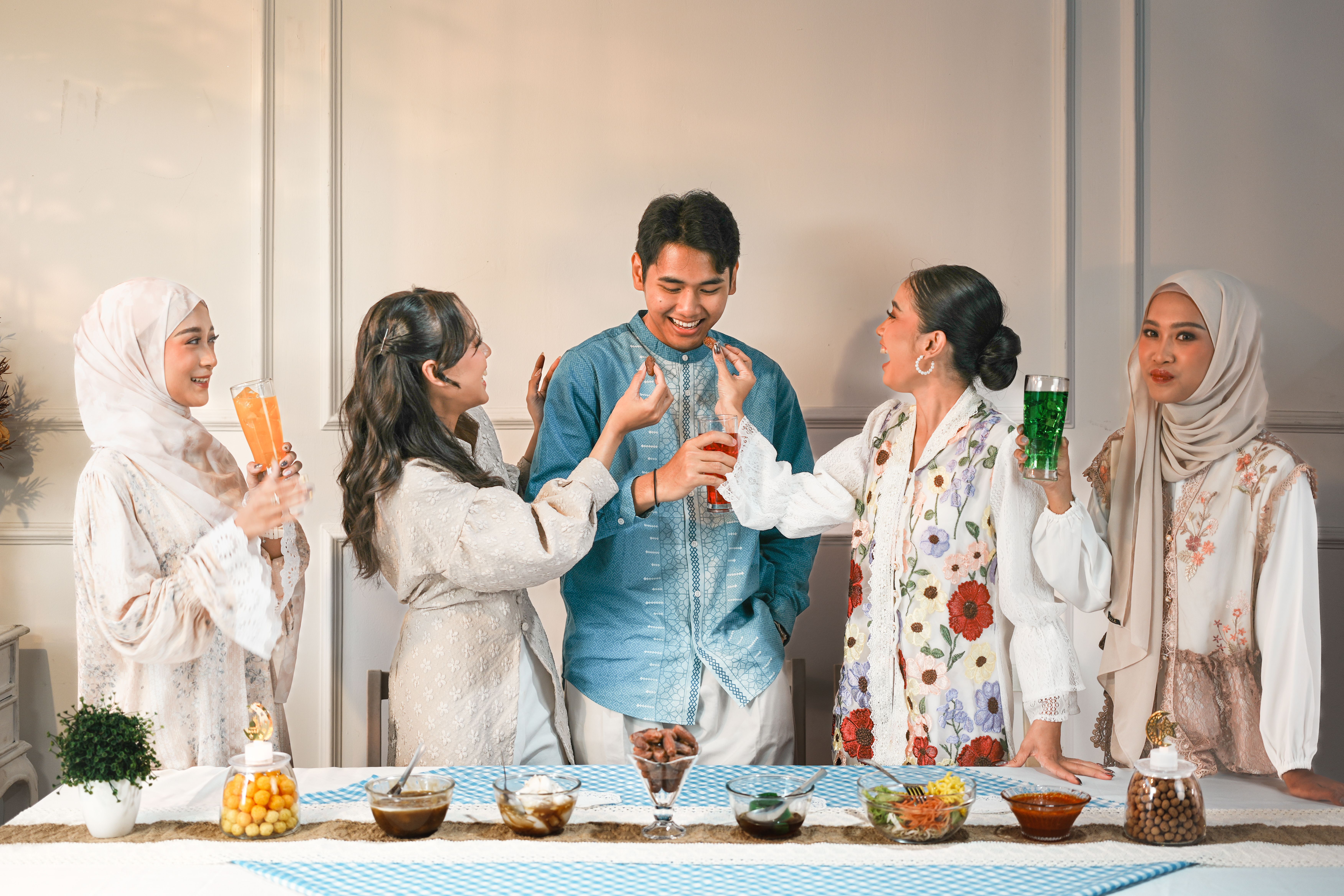 Group of Friends Enjoying Traditional Celebration · Free Stock Photo