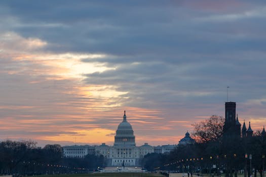 A breathtaking view of the US Capitol at sunrise in Washington, DC.