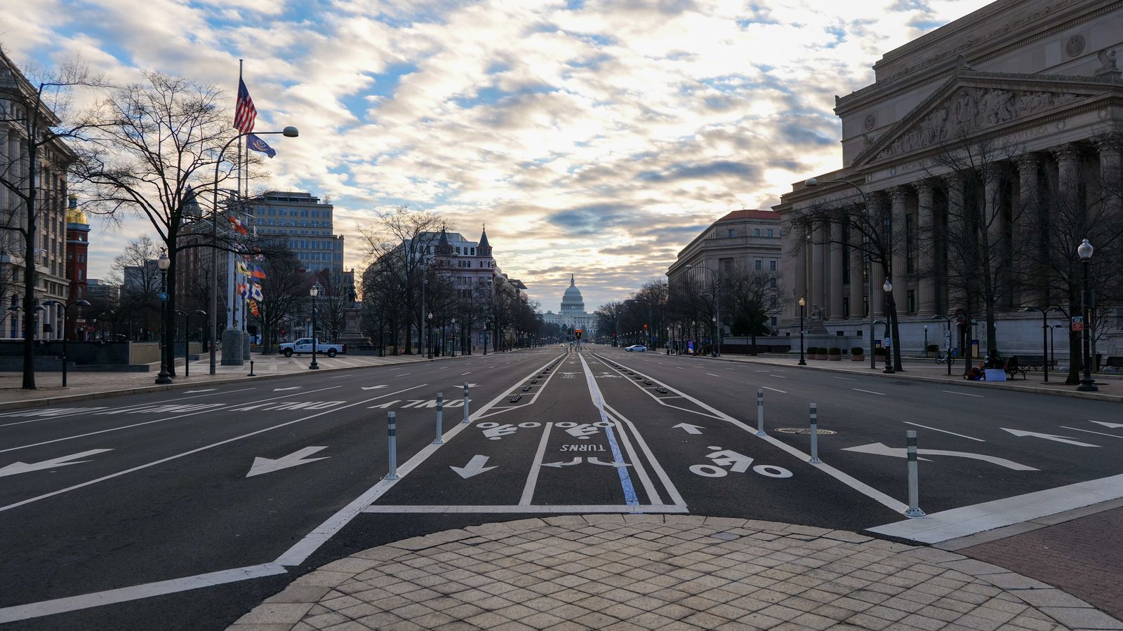 A serene early morning view of Pennsylvania Avenue with the US Capitol in the distance, Washington DC.