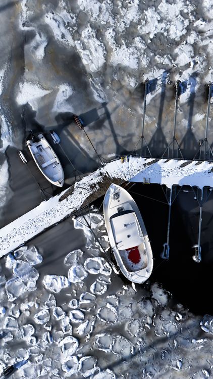Aerial View of Boats in Frozen Jönköping Harbor · Free Stock Photo