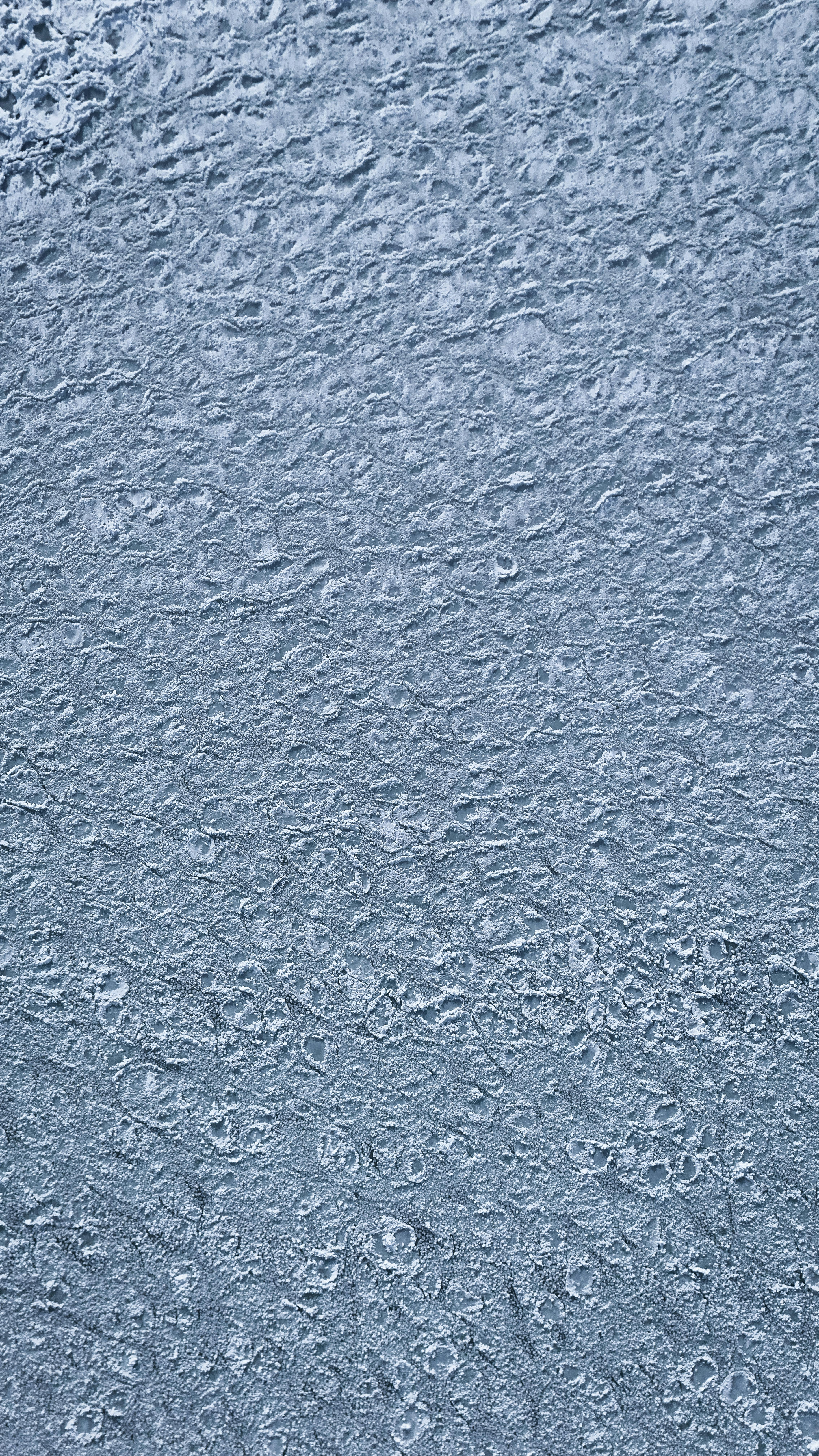 免费 瑞典延雪平，冰冻湖面的特写，展现出错综复杂的冰纹。 素材图片