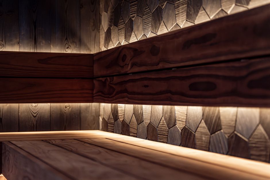 Modern dry sauna interior with cedar wood and soft lighting - hot tub sauna gym san diego Modern dry sauna interior with cedar wood and soft lighting - hot tub sauna gym san diego