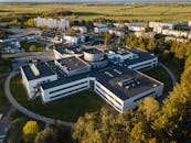Aerial View of Academic Campus Surrounded by Greenery