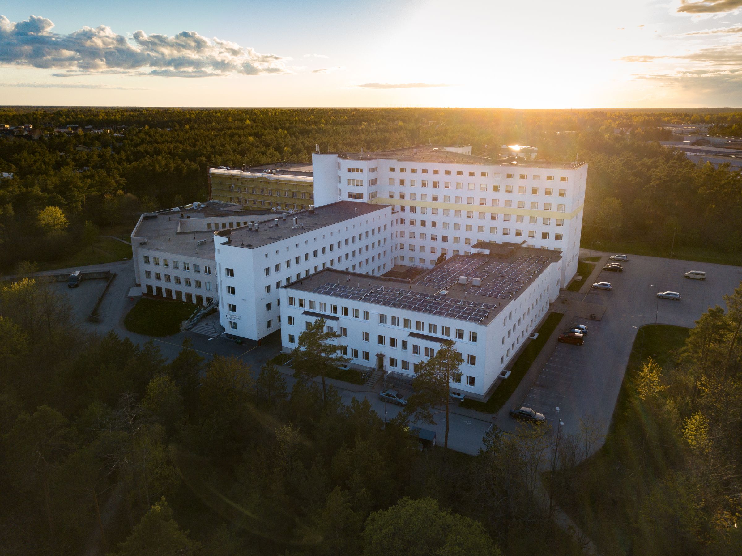 Hospital facility with surrounding parking area