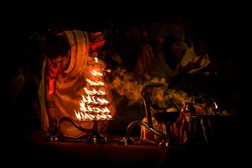 Free An enchanting night view of a Hindu aarti ceremony on the Ganges, Varanasi. Stock Photo