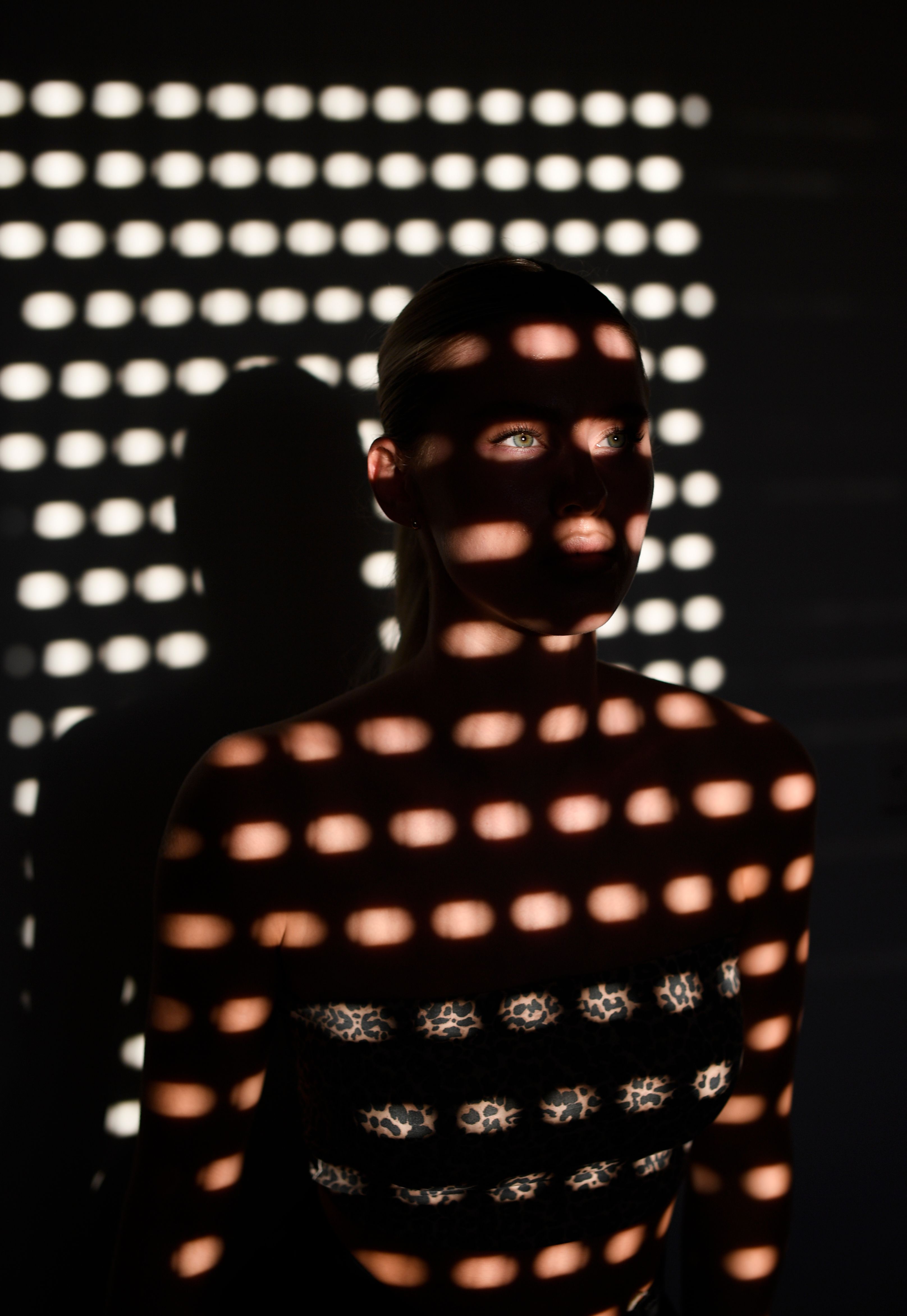 Moody Portrait with Dramatic Light Patterns · Free Stock Photo