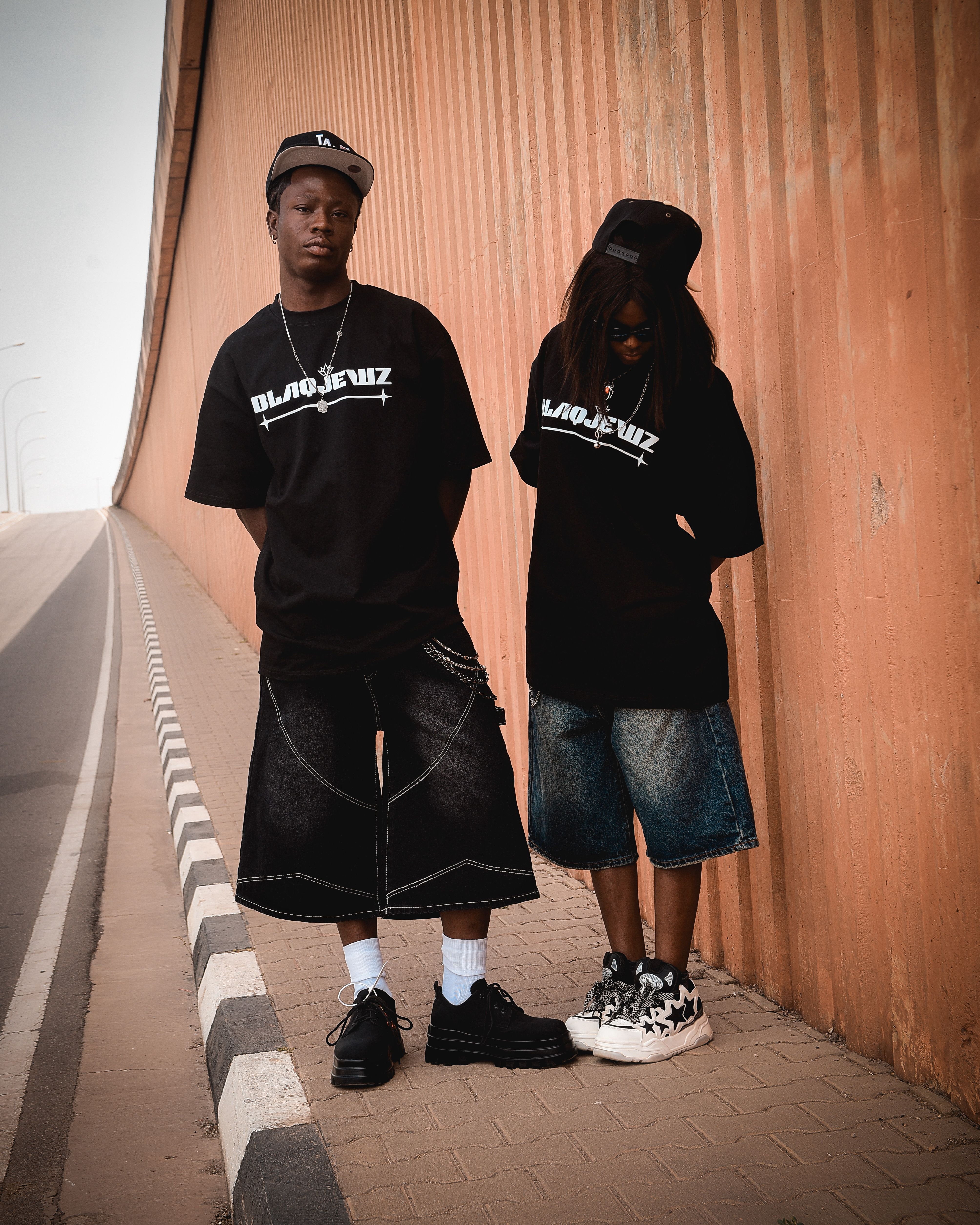 Streetwear models in heavyweight apparel