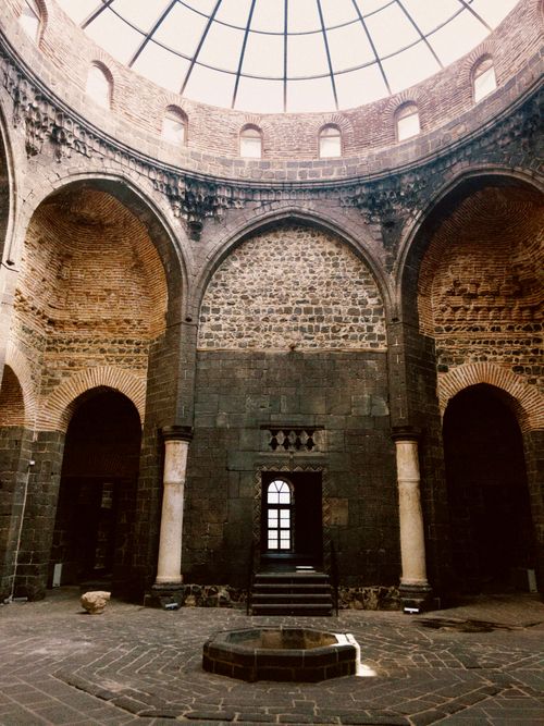 Free Explore the rustic charm of a historic dome architecture in Diyarbakır, Türkiye, capturing ancient stonework and arches. Stock Photo