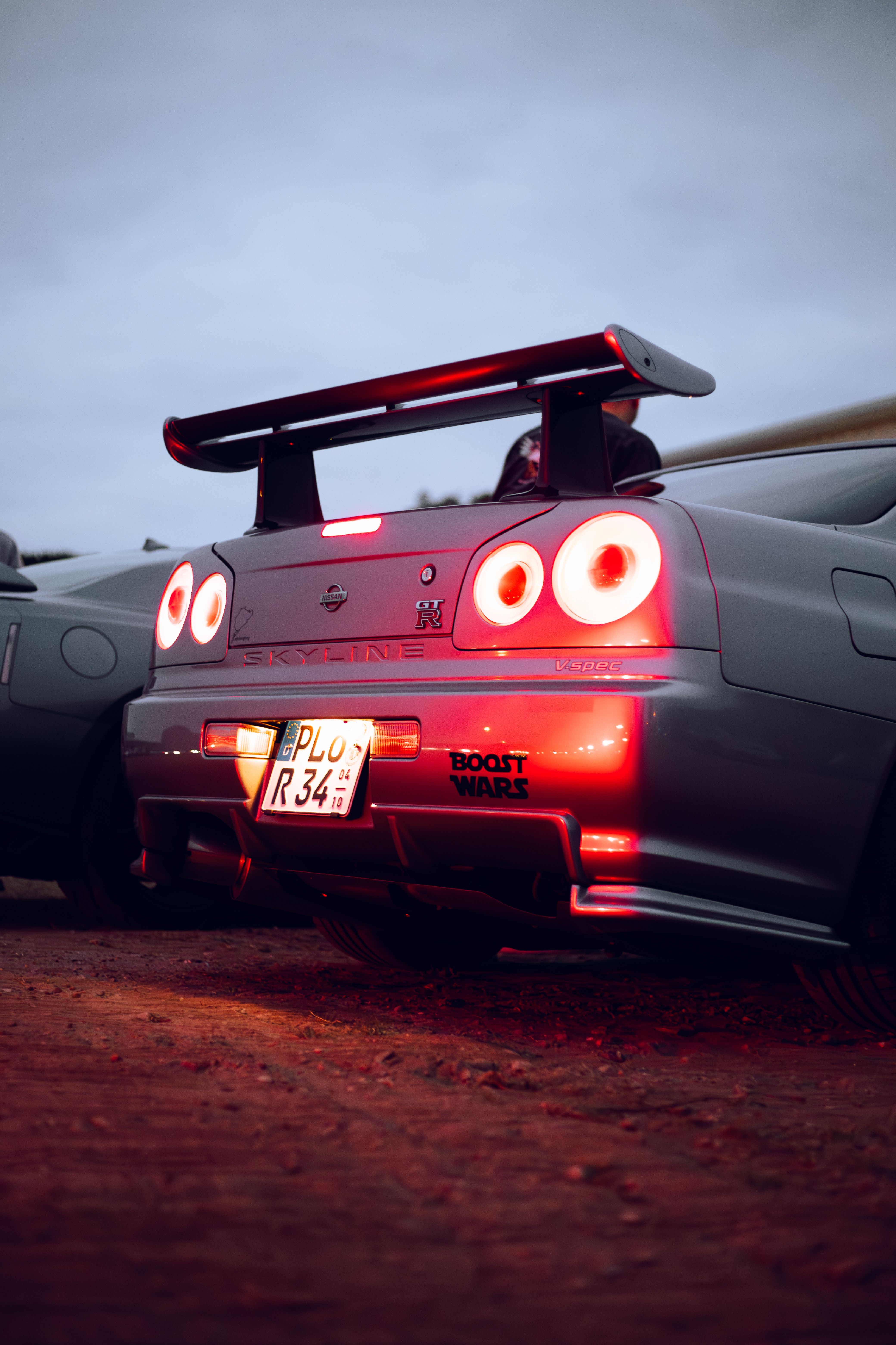 Rear View of a Nissan Skyline GT-R at Night · Free Stock Photo