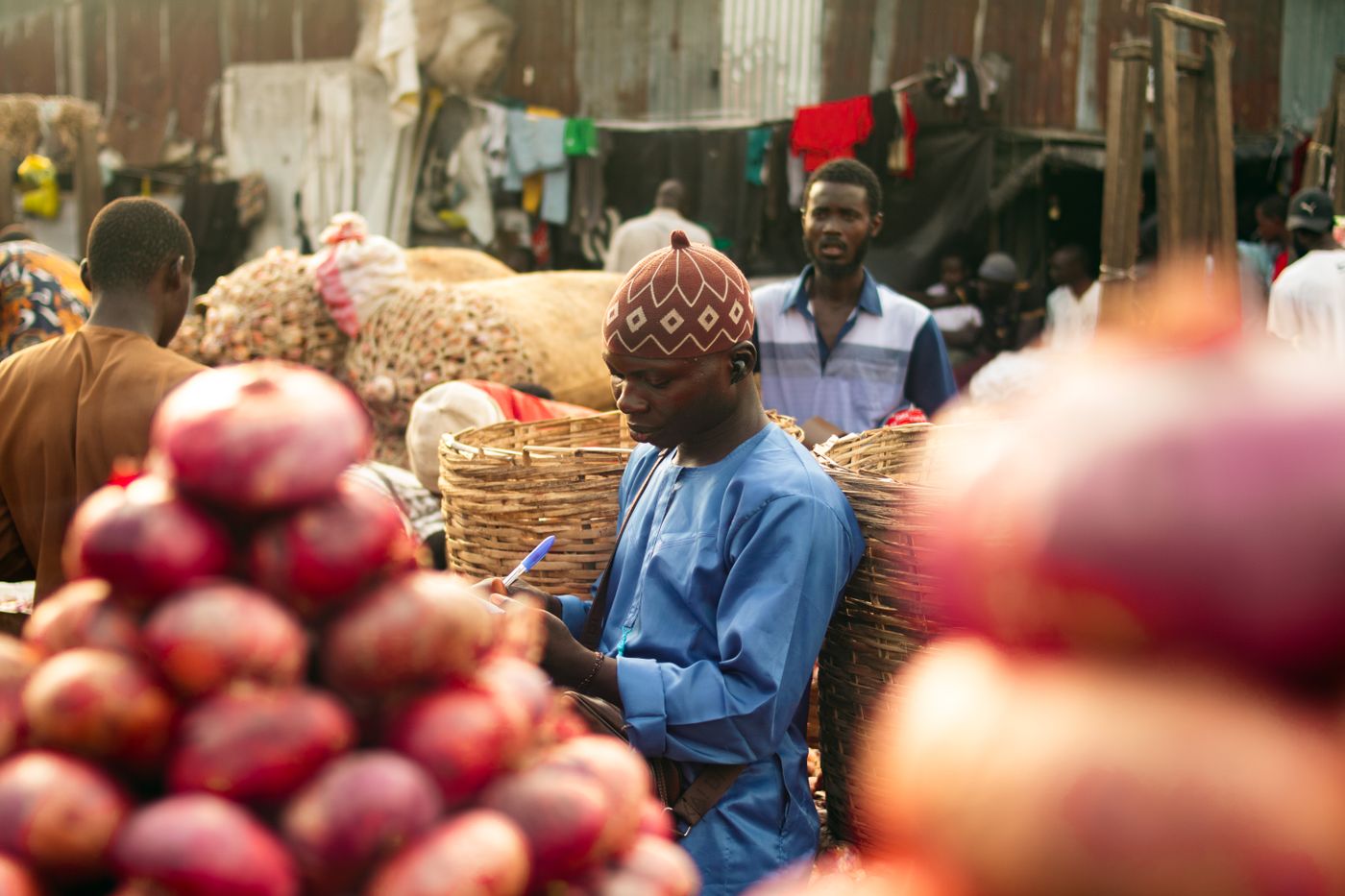 Busy Lagos market with vendors and goods on display
