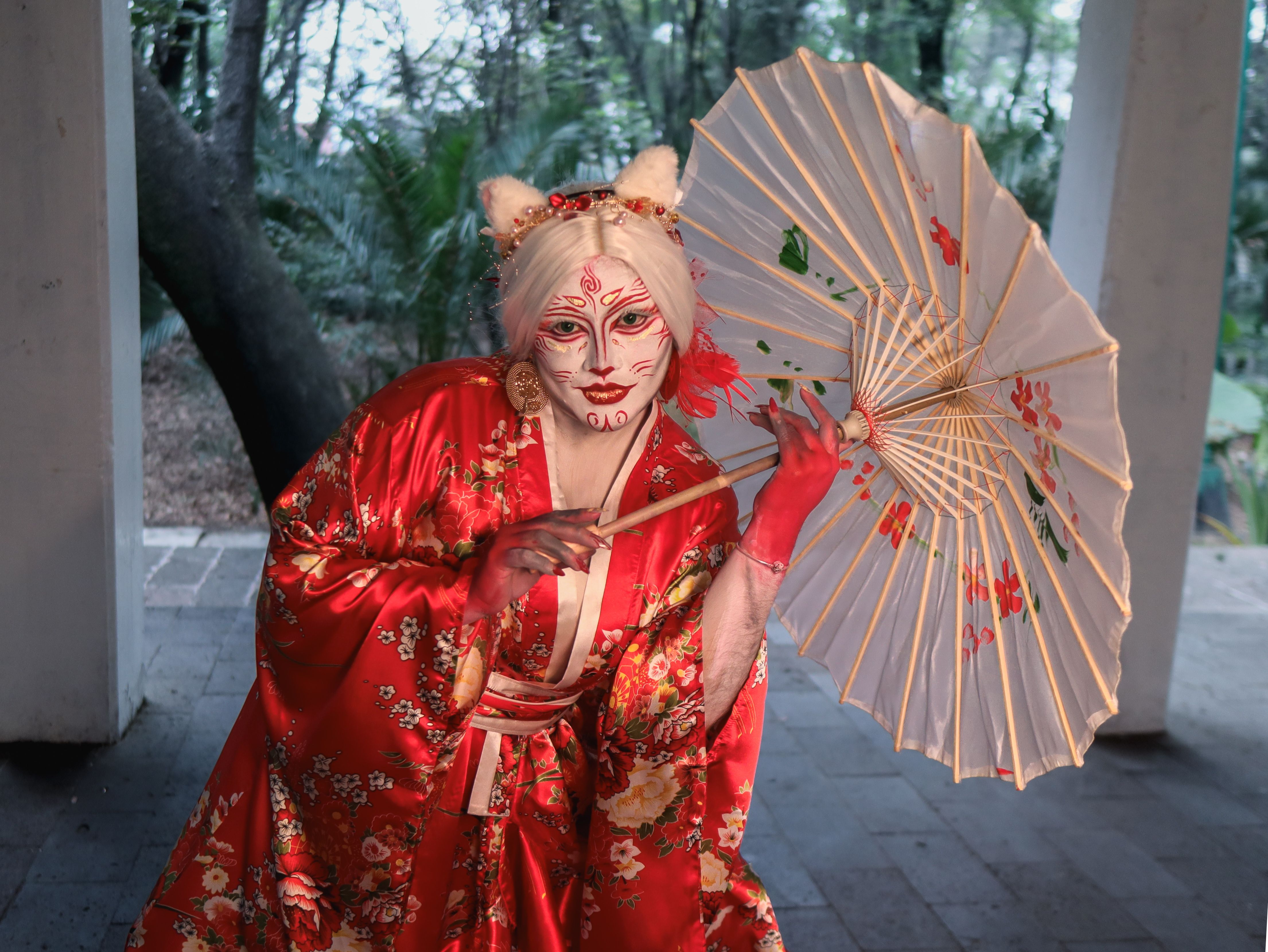 Artistic Performer in Red Kimono with Umbrella · Free Stock Photo