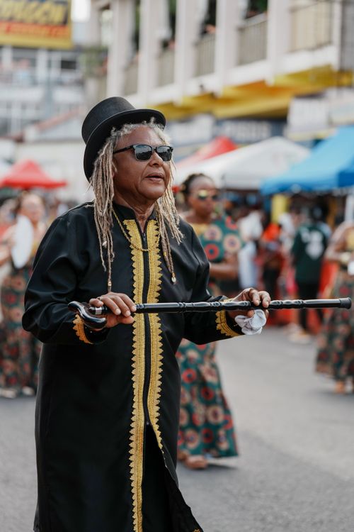 Free Vibrant cultural parade in Limón, showcasing traditional attire and heritage. Stock Photo