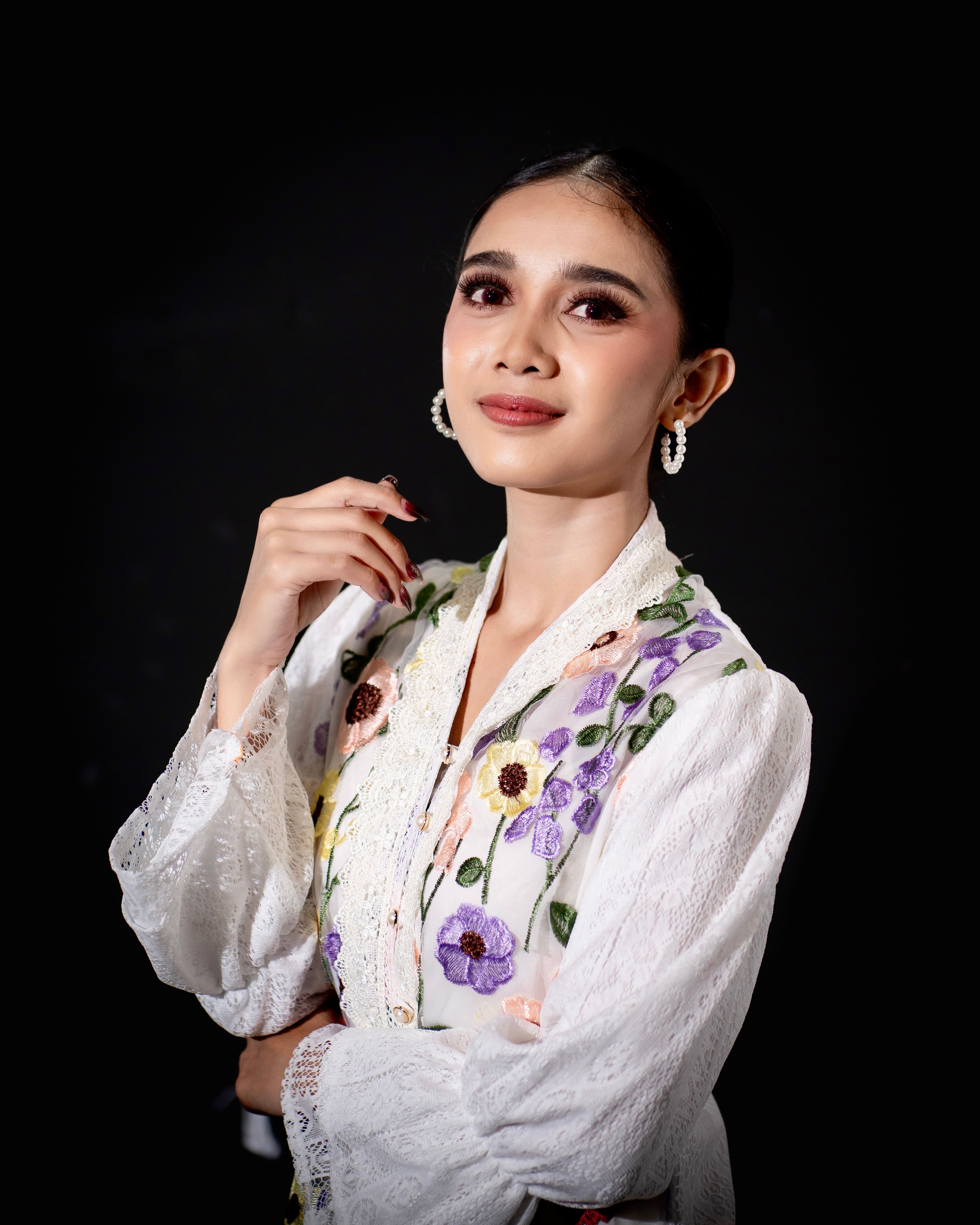 Elegant Portrait of Woman in Traditional Attire · Free Stock Photo