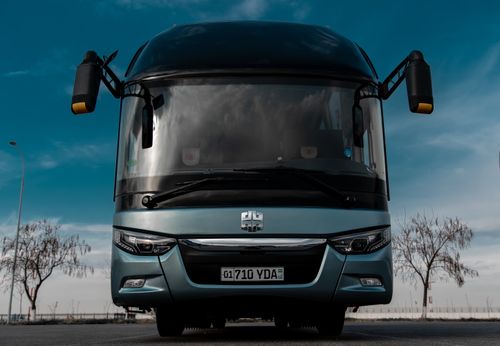 Free Front view of a parked modern bus in Tashkent, Uzbekistan on a clear day. Stock Photo