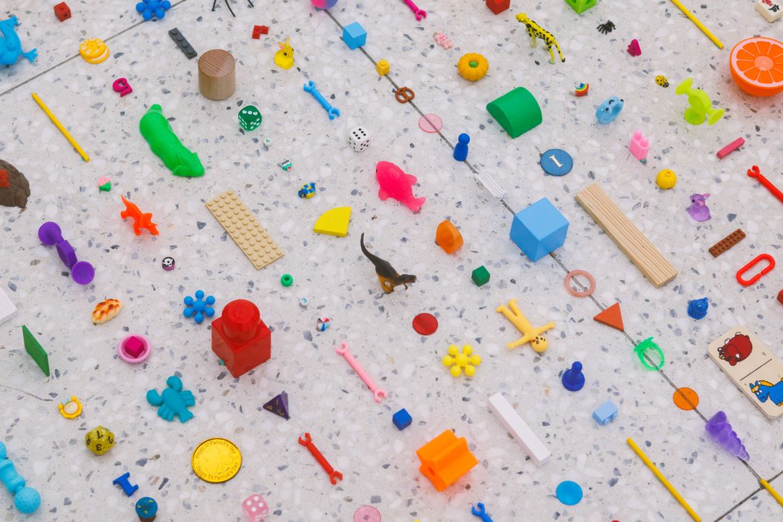 Colorful Assortment of Random Objects on Flat Surface ยท Free Stock Photo