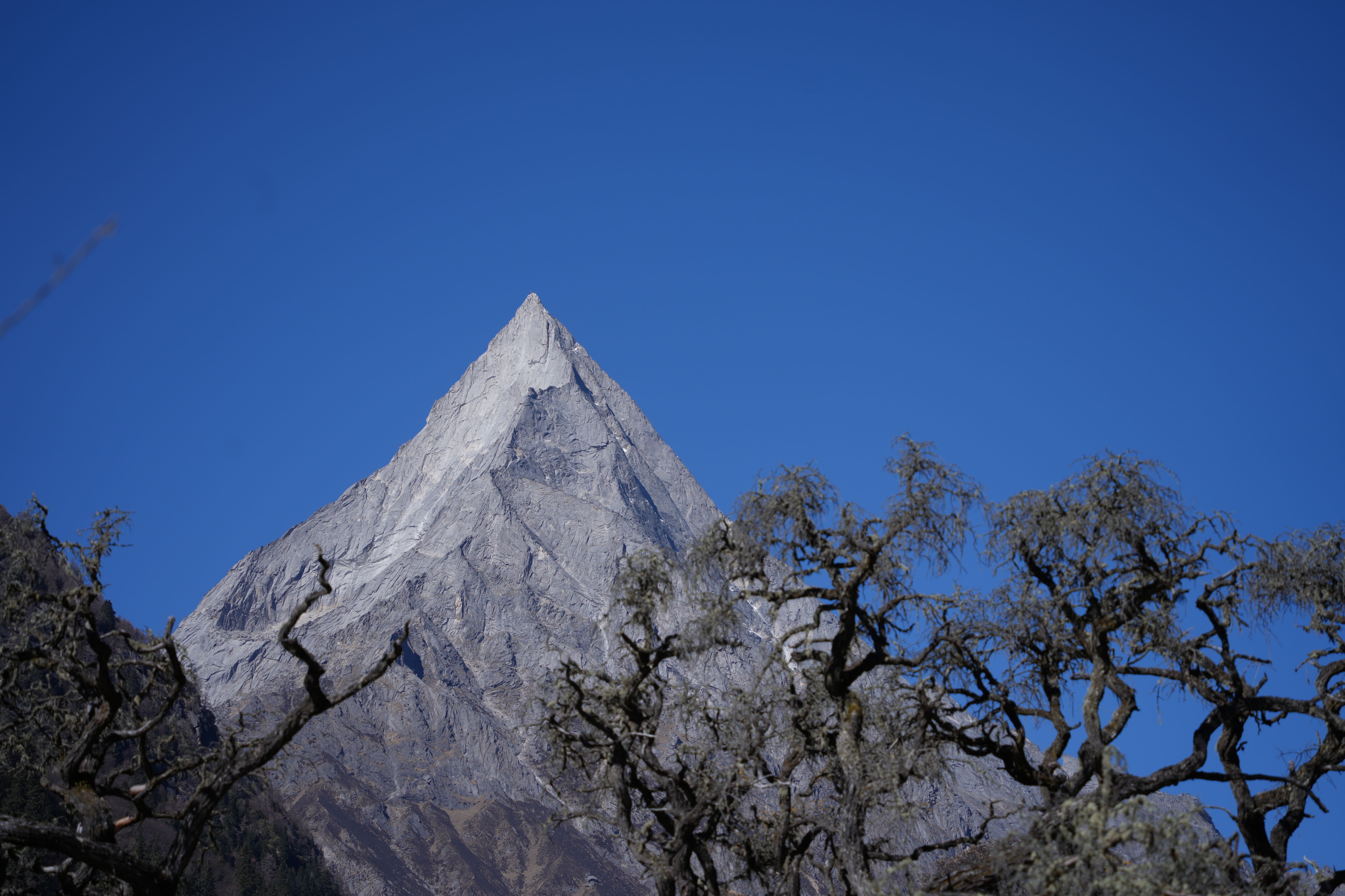 Majestic Mountain Peak Under Clear Blue Sky · Free Stock Photo