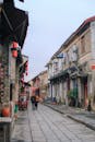 Charming Old Town Street with Lanterns and Rustic Charm