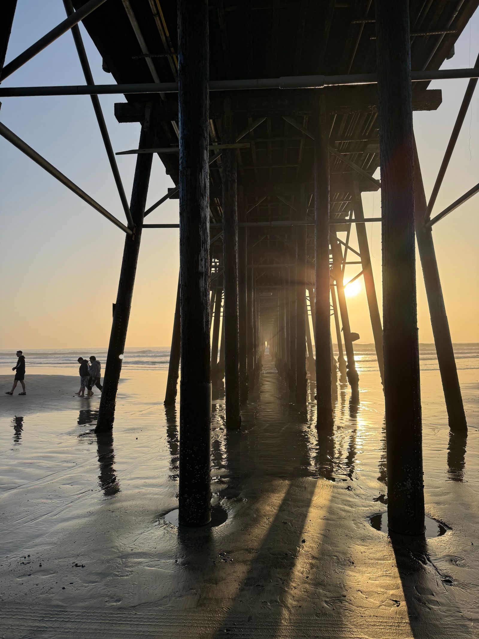Scenic Beach Sunset with Pier Silhouette · Free Stock Photo