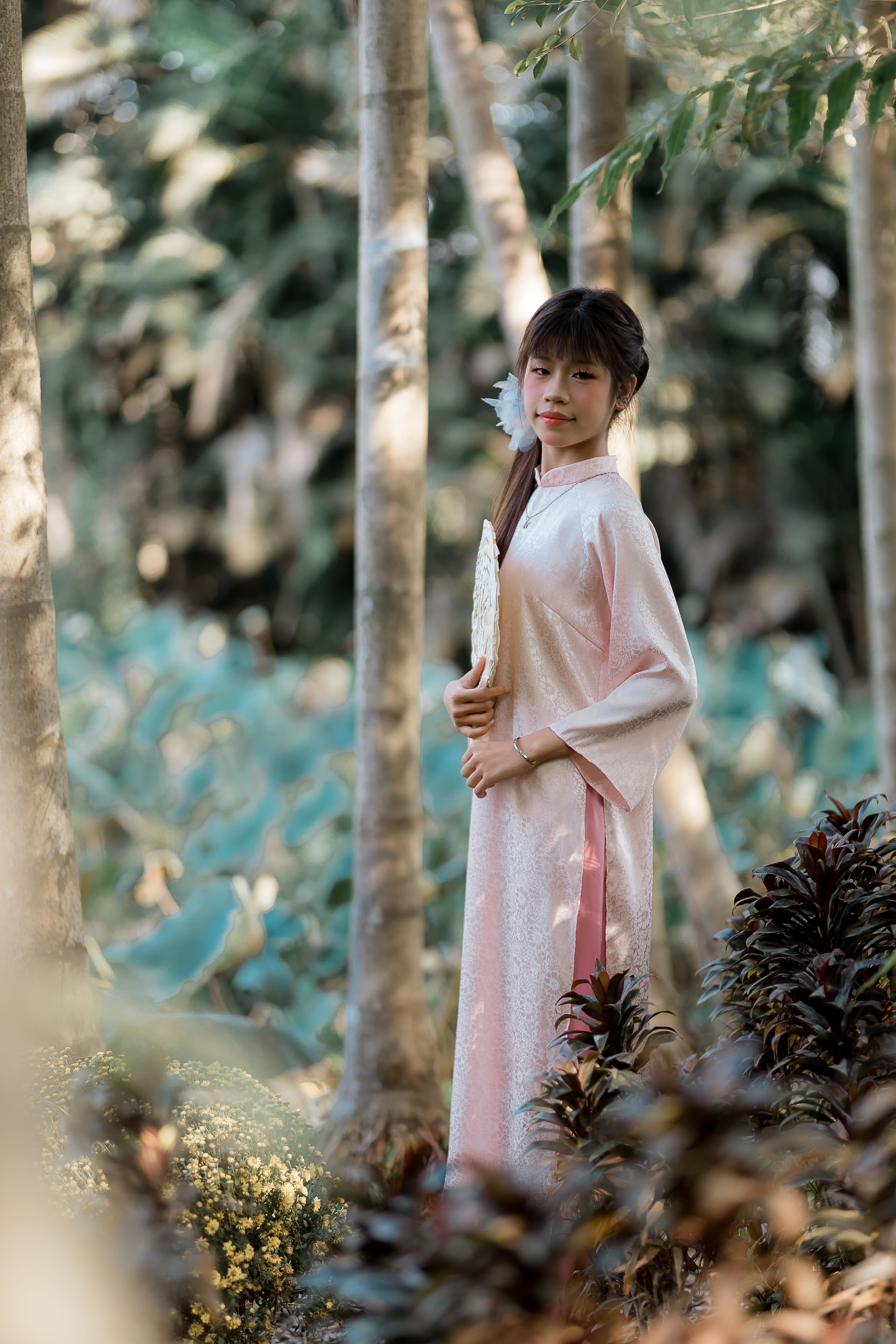 Portrait of Woman in Traditional Pink Dress Outdoors · Free Stock Photo
