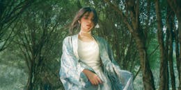 Serene Woman in Kimono Posing Outdoors