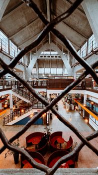 Explore the architectural beauty inside the bustling Wrocław Market Hall in Poland.